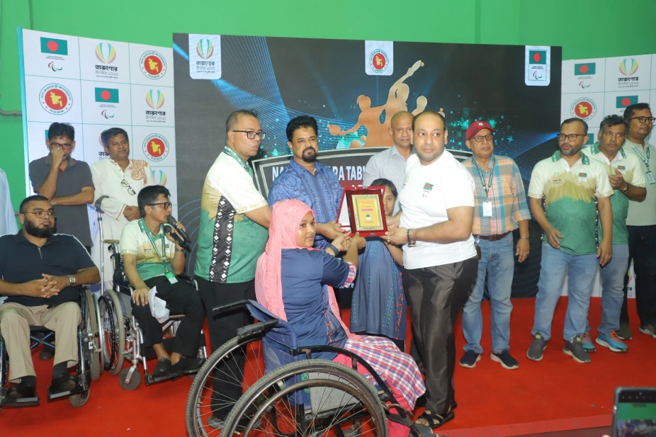 President BPC Md. Masudul Hassan handing over crest at Amputee Football Festival